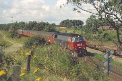 DSB MZ 1430 (type III) photographed in Fredericia 1. June 1979.  The MZ class (type III) was purchased from 1972 to 1974 in a number of 20. None of these engines remain in service by DSB. MZ 1431 was deposited in 2001. Built by NOHAB and Frichs. Dieselelectric. Co'Co'. 3900 hp. Max speed 165 km/h - 102 mph. Length 21 000 mm. Weight 125 metric tonnes.